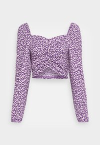 Krátký top z fialové látky s bílými a žlutými květinovými vzory. Má dlouhé rukávy a čtvercovou výstřih s nařasenými detaily na přední straně.