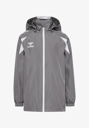 Grå sportjacka med vita axelaccents, frontdragkedja, elastiska muddar, huva och hummel-logotyp på vänster bröst.