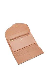 Blush pink leather wallet with a snap closure, interior zip pocket, and multiple card slots. Smooth texture with minimal stitching detail.