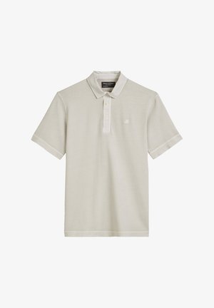 Poloshirt in hellem Beige. Kurze Ärmel, Kragen, Zwei-Knopf-Leiste. Subtiles Logo auf der linken Brust. Hergestellt aus weichem, strukturiertem Stoff.