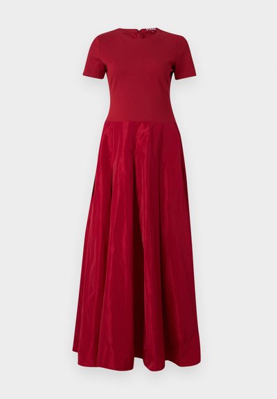 Red maxi dress with short sleeves, fitted top, and a flowing skirt. Made of smooth fabric with a subtle sheen and a concealed back zipper.