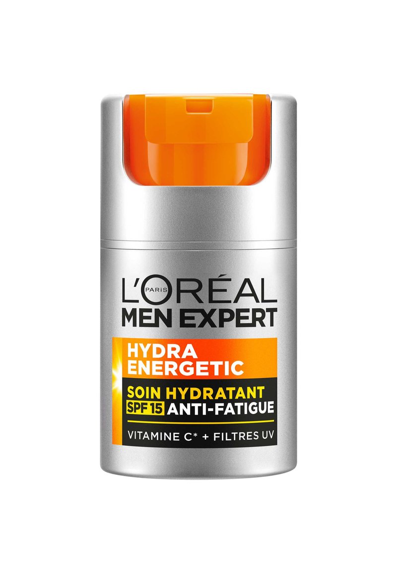 Hydratant L'Oréal Men Expert Hydra Energetic dans un conteneur cylindrique argenté avec un couvercle orange à pression, étiqueté SPF 15, anti-fatigue.