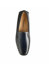 Zwarte leren instap schoenen met een gladde afwerking, ronde neus en stiksel details langs de naad. Contrasterende tan binnenvoering zichtbaar.