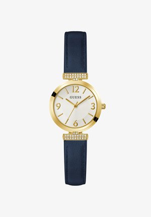 Guld-tone armbåndsur med en rund hvid urskive, marineblå læderrem og dekorative krystal accenter nær urhornene. Arabiske tal ved 3, 6, 9 og 12.