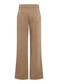 Beige weit geschnittene Hose mit elastischem Bund, zwei Gesäßtaschen und einer glatten Textur. Das Design ist auf einen lockeren Schnitt ausgelegt.