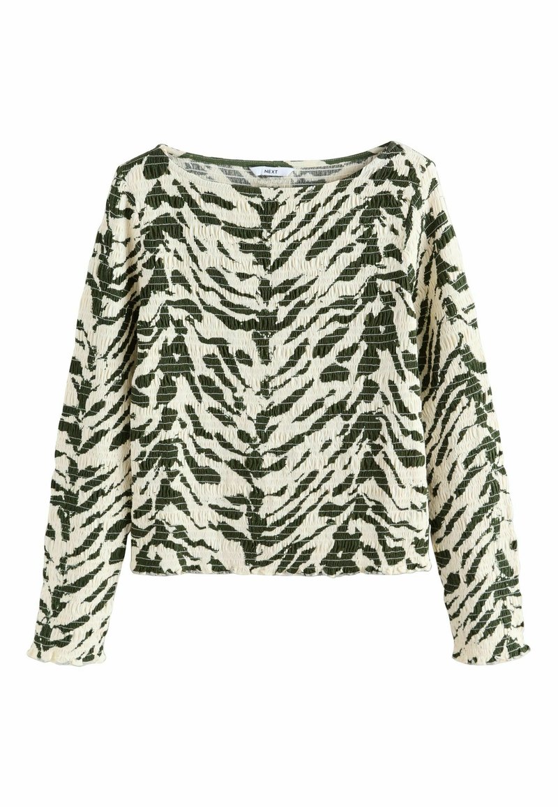Haut à manches longues rayé vert et crème avec tissu texturé et encolure bateau, présentant un motif rayé tigre et des poignets festonnés.