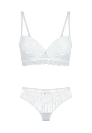 Hvid blonde-bh og matchende trusser med blomstermønstre og små dekorative sløjfer foran i midten.