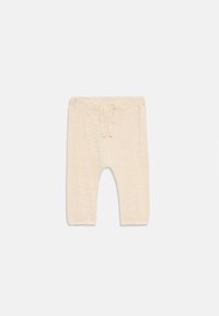 Béžové detské nohavice vyrobené z mäkkého jersey materiálu, s elastickým pásom na šnúrku a slemovými lemy.