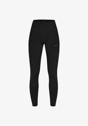 Czarne legginsy z wysokim stanem, wykonane z elastycznego materiału. Posiadają dwie boczne kieszenie oraz małe logo na lewej udzie.