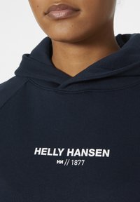Helly Hansen CORE - Jersey con capucha - blau