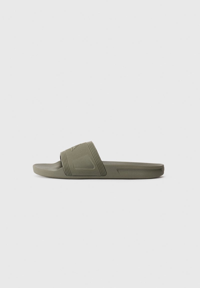 Single olive green slide sandal with textured strap and contoured footbed on a plain white background.
