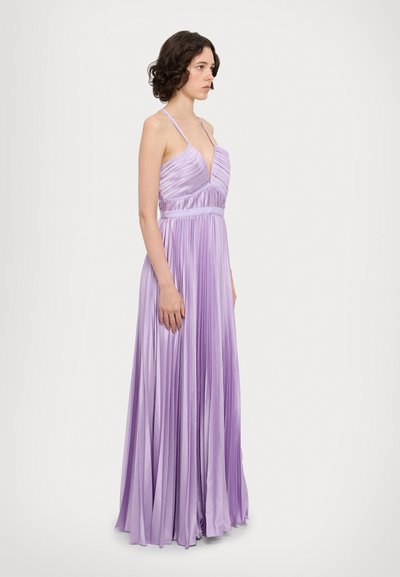 Pleated lavender gown with a deep V-neck and adjustable straps; features a fitted bodice and flowing skirt, creating a graceful silhouette.