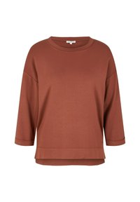 Top leggero color ruggine con maniche a tre quarti, scollo rotondo e vestibilità rilassata. Presenta un orlo a strati per un tocco di dettaglio in più.