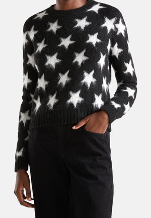 Stickad tröja - black
