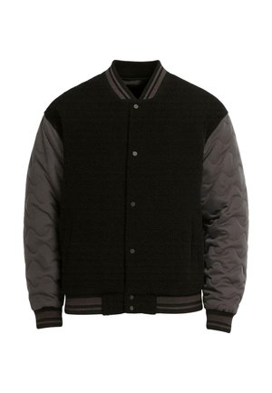 Must ülikoolijakk tekstuuriga villa kehaga ja tikandiga hallide varrukatega. Omaduseks soonikuga krae, varrukasääred ja talje, kinnitatav klõpsuga.