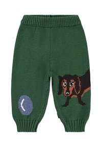 Pantalon vert tricoté pour enfants avec une taille côtelée, comportant un motif de teckel et une balle bleue sur le côté.