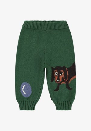 Groene gebreide kinderbroeken met een geribde tailleband, met een teckelontwerp en een blauwe bal aan de zijkant.