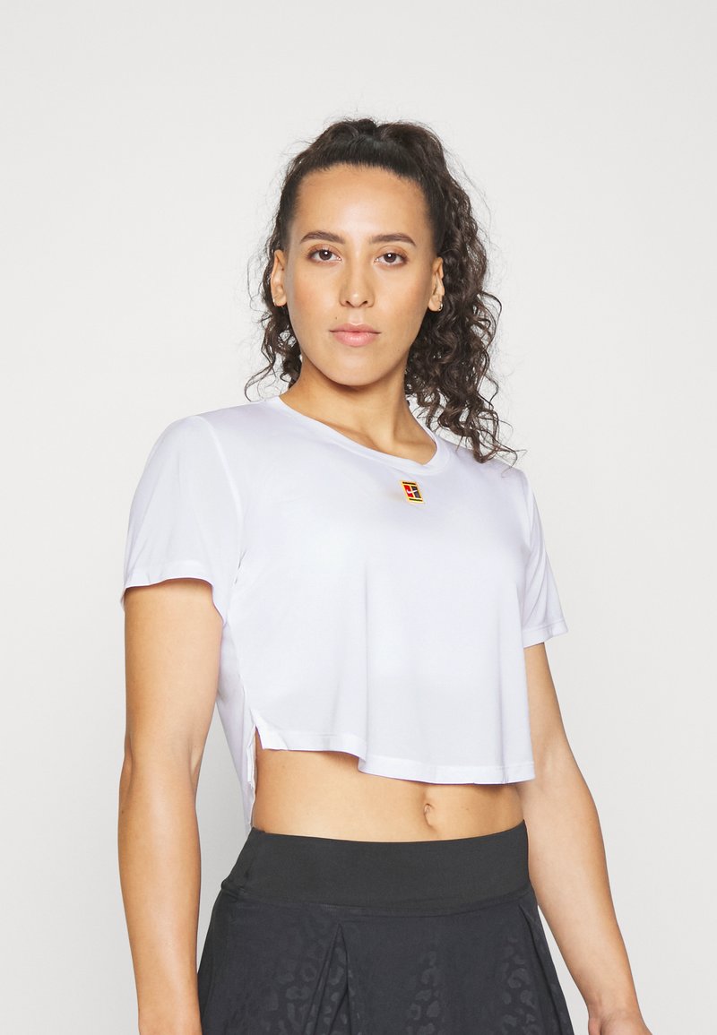 Nike Performance HERITAGE Sports Tshirt white Zalando.ie