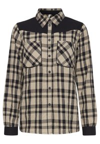 Randig skjorta med ett beige och svart rutmönster, knäppning fram, två påsydda fickor och svarta axelinslag. Långa ärmar, avslappnad passform.