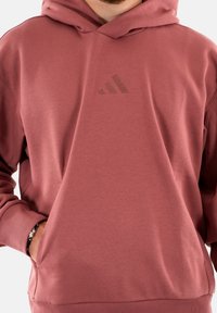 adidas Originals Jersey con capucha - rouge
