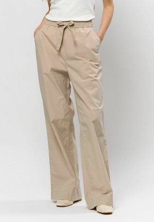 Nohavice - white pepper