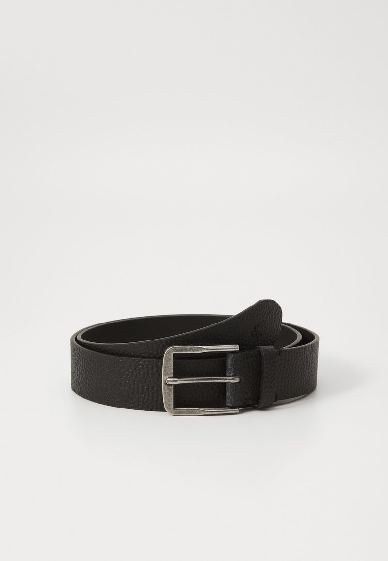 Black leather belt with a textured finish, featuring a silver metal buckle. The belt has a smooth underside and a classic design.