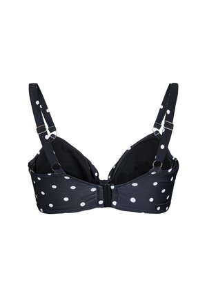 Soutien-gorge noir à pois blancs, avec des bretelles réglables et une fermeture à crochet. Texture lisse avec une forme structurée.