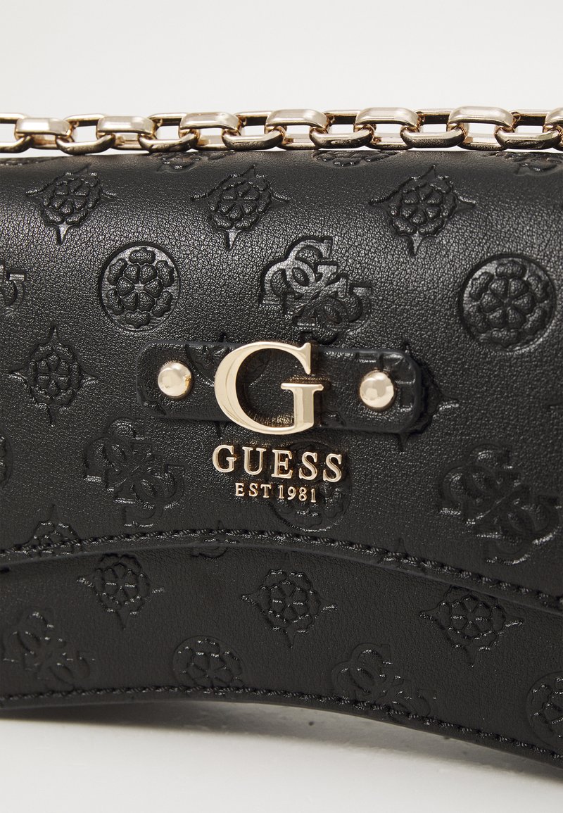 Guess Gerty Small Convertible Flap Crossbody in Black