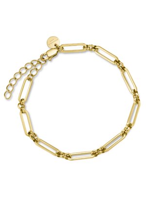 Pulsera de cadena de metal dorado con eslabones alargados y rectangulares, y una pequeña etiqueta circular. Presenta un cierre ajustable con una extensión de cadena.