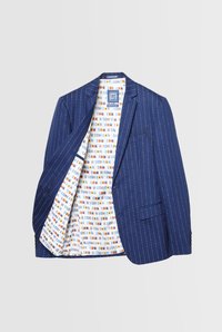 Blazer blu navy con righe sottili, foderato in bianco con un motivo di forme geometriche colorate, taschino sul petto e due tasche frontali.