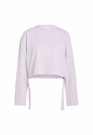 Vihreä purppura lyhyt hihainen collegepaita, jossa on pyöristetty pääntie ja sivusiteet. Pehmeä rakenne, sileä kangas ja minimalistinen muotoilu.