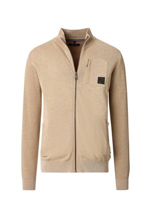 Beige Reißverschlussjacke mit hohem Kragen, strukturiertem Stoff, gerippten Bündchen und einer vorderen Brusttasche mit einem schwarzen Logo-Patch.