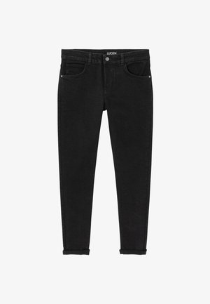 Jeans noir slim en denim de coton, avec cinq poches, garnitures argentées et revers roulés pour une apparence ajustée.