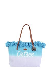 Blau-witte geweven tote bag met rafelige randen, leren handvatten en een label. Bevat het woord "Ostsee" in witte letters.