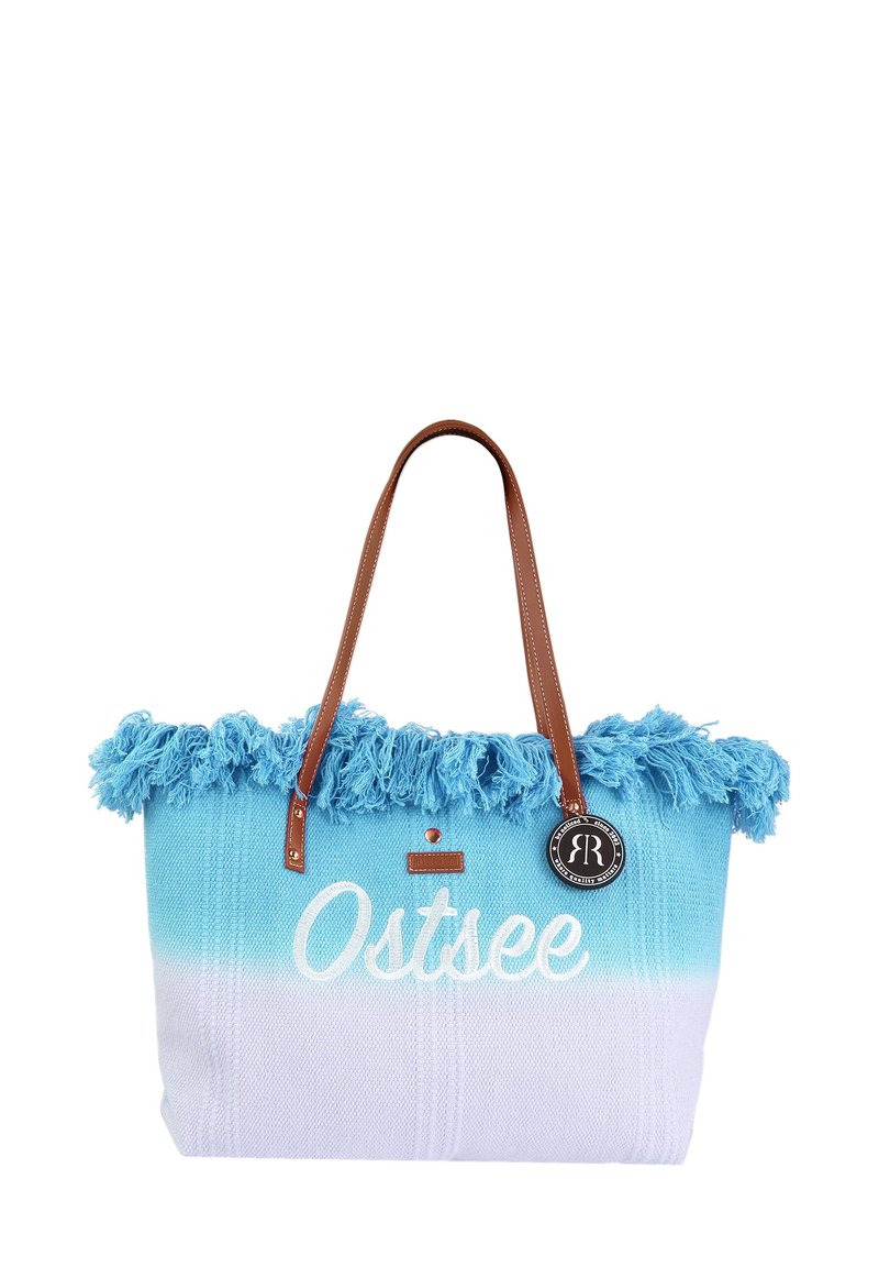 Blau-witte geweven tote bag met rafelige randen, leren handvatten en een label. Bevat het woord "Ostsee" in witte letters.