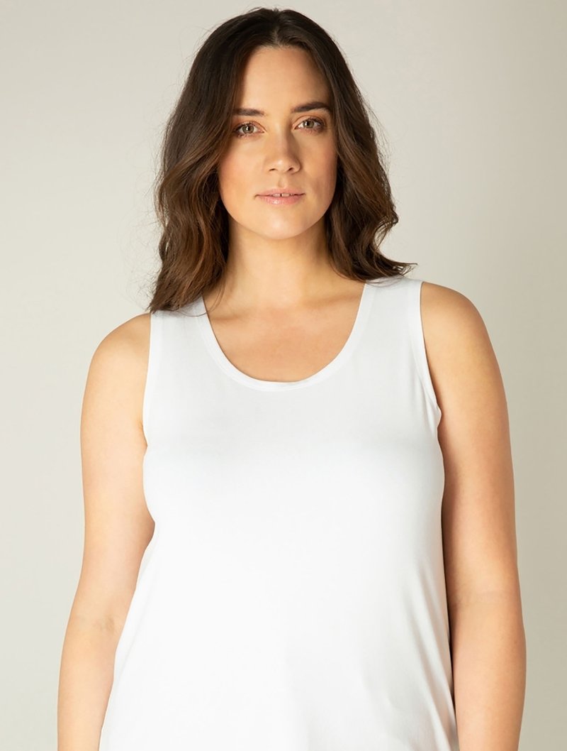 Witte mouwloze tanktop van gladde katoenmix, met een ronde halslijn en een ontspannen pasvorm.