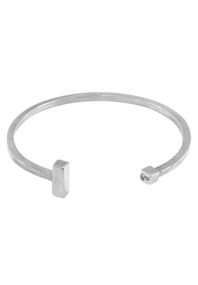 Sterling silver cuff bracelet with a thin circular band, featuring rectangular ends and a polished finish. Simple, modern design.