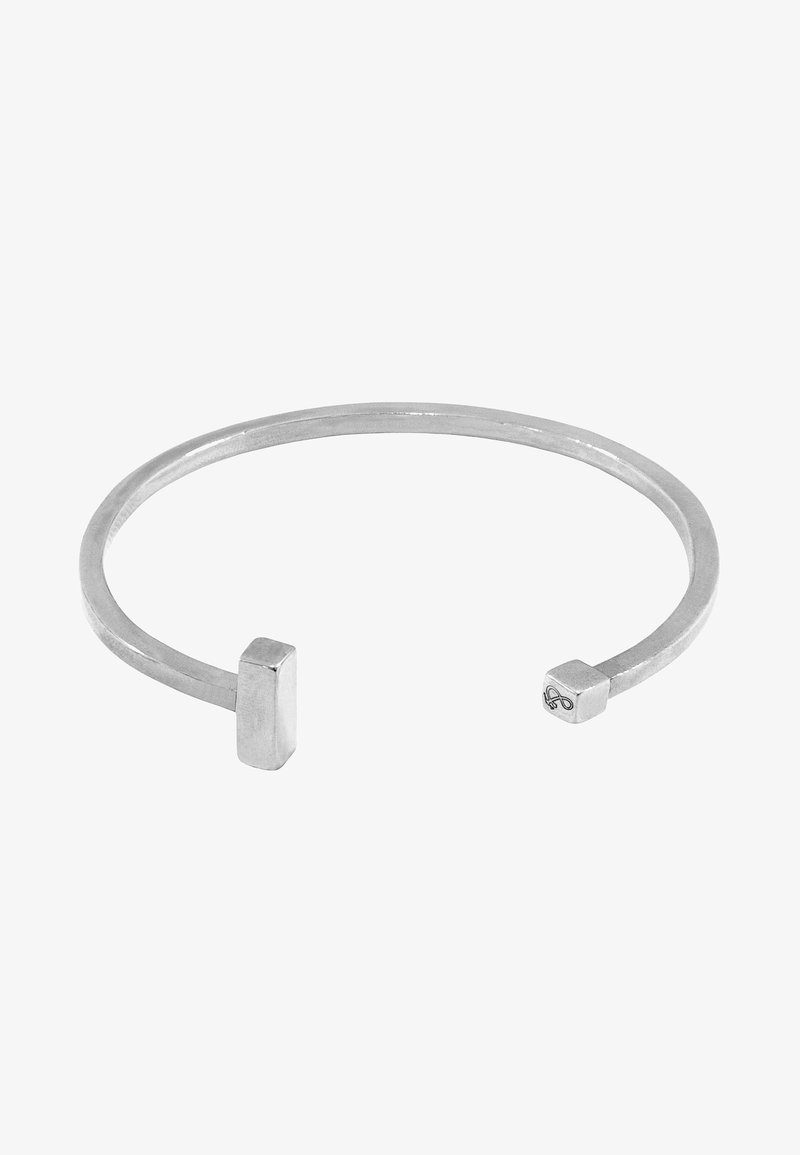 Sterling silver cuff bracelet with a thin circular band, featuring rectangular ends and a polished finish. Simple, modern design.