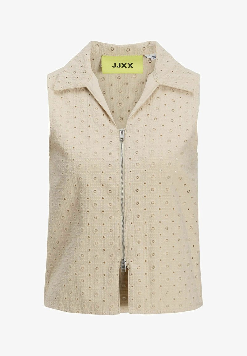 Bež majica bez rukava s patentnim zatvaračem sprijeda, koja sadrži teksturirani uzorak malih cvjetnih motiva i oštar ovratnik. Označena marka vidljiva unutra.