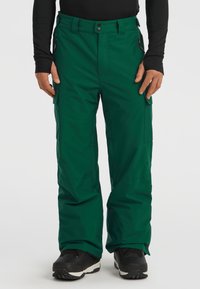 Green snow pants made of water-resistant material, featuring cargo pockets, a zippered side pocket, and reinforced cuffs.