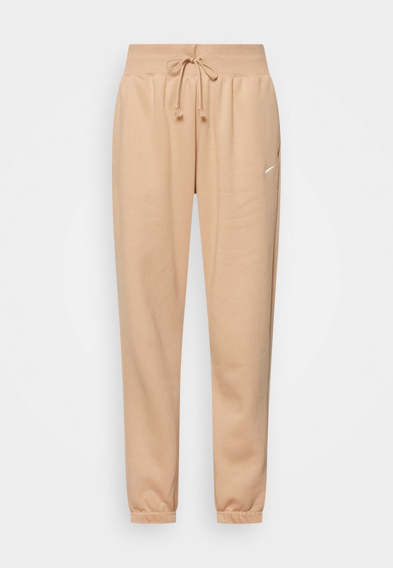 Pantaloni della tuta beige realizzati in morbido misto cotone, con cintura elastica e coulisse, e fondo gamba con polsini. Dettaglio logo piccolo.