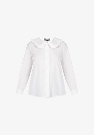 Valge pika varrukaga särk suure volangkraega, eesnupu kinnitusega ja sujuva puuvillase tekstuuriga. Omab rõhutatult sobivaid mansette.