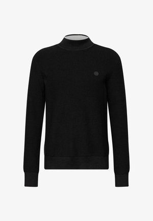 Černý žebrovaný pletený svetr s vysokým výstřihem, dlouhými rukávy a malým kulatým logem na hrudi. Hladká textura, přiléhavý střih.