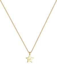 Goldfarbener Halsreifen mit einer dünnen Kette und einem sternförmigen Anhänger, der ein lächelndes Gesicht zeigt. Die Oberfläche ist glatt und glänzend.
