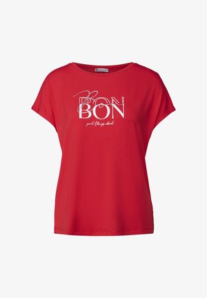 Červené tričko s krátkým rukávem z měkké bavlněné směsi. Obsahuje bílý a stříbrný grafický potisk se slovem "BON" a kurzívními akcenty. Široký výstřih.