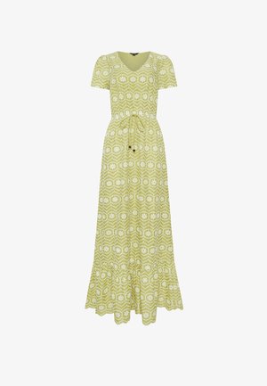 Vaaleanvihreä maksimekko, jossa on valkoisia kukkaompeleita, lyhyet pussihihat, V-aukko, vyötäröllä säädettävä nyöri ja aaltoileva helma.