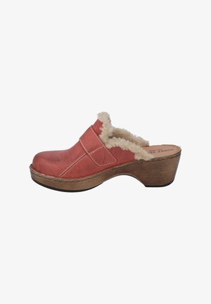 Red leather clog shoe with a cushioned sheep wool lining, wooden heel, and white stitching details. Curved shape with an open back.