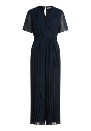 Robe plissée bleu marine avec manches courtes en tissu transparent, devant croisé en V, ceinture à la taille et détail en forme de goutte à l'encolure arrière.