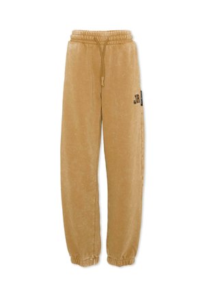 Pantalones deportivos marrón claro con cintura y puños elásticos, cordón delantero y pequeñas letras impresas en la parte superior del muslo.