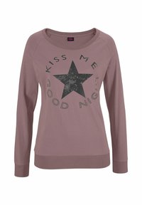 Long-sleeve, mauve sweatshirt with a loose fit. Features a black star graphic and text "KISS ME GOOD NIGHT" in circular layout. Textured fabric.